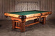 The Logan Logger staged in a lodge-inspired room with warm wood tones and ambient lighting. Its timber pine build and dark burl accents make a commanding centerpiece for mountain homes, ranch retreats, or rustic-chic commercial spaces. The Logan Logger staged in a lodge-inspired room with warm wood tones and ambient lighting. Its timber pine build and dark burl accents make a commanding centerpiece for mountain homes, ranch retreats, or rustic-chic commercial spaces.